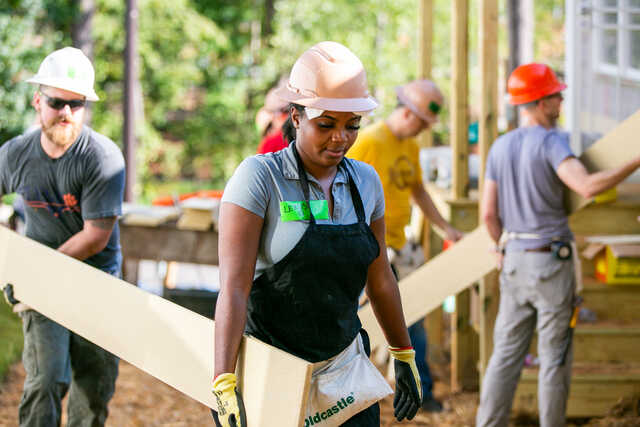 Volunteers serving with Habitat for Humanity